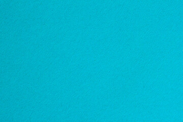 Fototapeta na wymiar Texture of artistic paper, bright blue cerulean color. Fashionable background