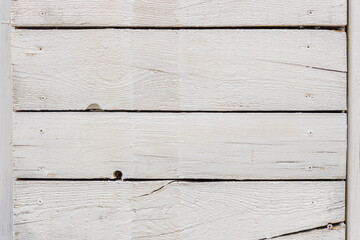 Obraz premium White painted wood planks or wall texture with screws and cracked wood, use as background or texture for game assets.