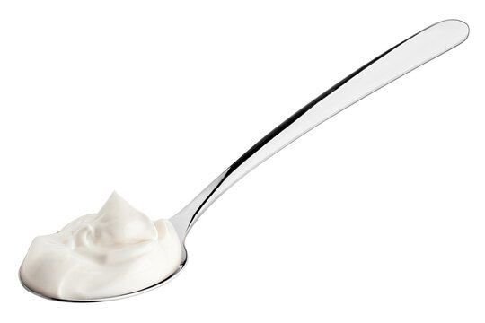 sour cream in spoon, mayonnaise, yogurt, isolated on white background, clipping path, full depth of field