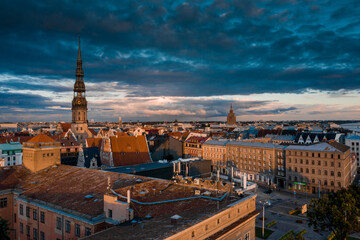 Magical stormy sunset over Riga old town - the capital of Latvia. Stormu clouds forming in the sky....