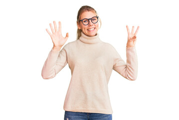 Young beautiful blonde woman wearing turtleneck sweater and glasses showing and pointing up with fingers number eight while smiling confident and happy.