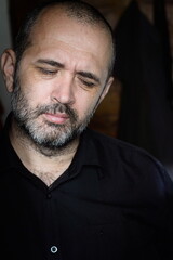 portrait of man expressing pain