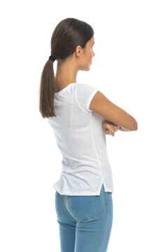 Back side view casual woman holding hands folded