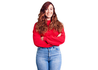 Young beautiful woman wearing casual winter sweater happy face smiling with crossed arms looking at the camera. positive person.