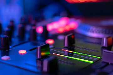 Fototapeta na wymiar audio controller on mixing dj party 