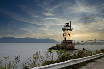 Sunset view of Sleepy Hollow lighthouse in Tarrytown over Hudson River on a cloudy day