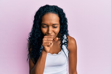 Fototapeta na wymiar Middle age african american woman wearing casual clothes feeling unwell and coughing as symptom for cold or bronchitis. health care concept.
