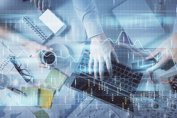 Double exposure of man and woman working together and forex graph hologram drawing. Financial analysis concept. Computer background. Top View.