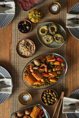 Top view background image of delicious homemade food on autumn dinner table, copy space