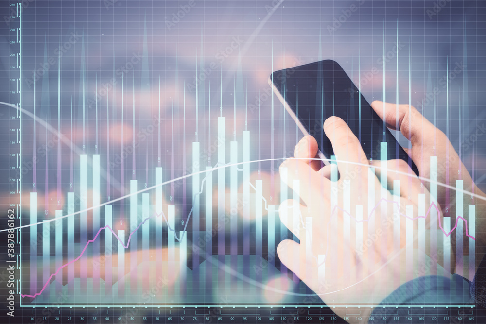 Aufkleber double exposure of man's hands holding and using a digital device and forex graph drawing. financial