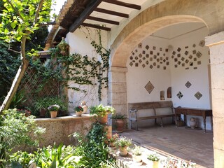 Valldemossa, Mallorca, Balearic Islands / Spain - 17th of August 2020: View on empty and peacefull Frederic' Chopin cell's garden in Chopin Museum in Carthusian Monastery