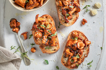 Homemade Toast with chanterelles, thyme and parmesan cheese