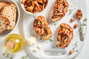 Homemade Toast made of wild mushrooms, thyme and olive
