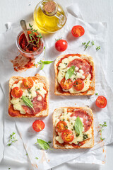 Homemade Toast with salami, cheese and tomato