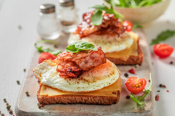 Homemade toast with egg, cheese and bacon