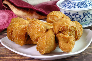 Deep fried dough fritters or 