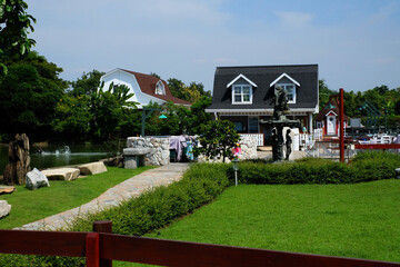 Vintage houses with grass yard and stone decoration