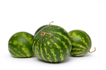 Ripe, green watermelons isolated on white background