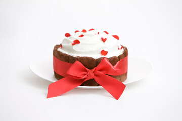 cake with red ribbon