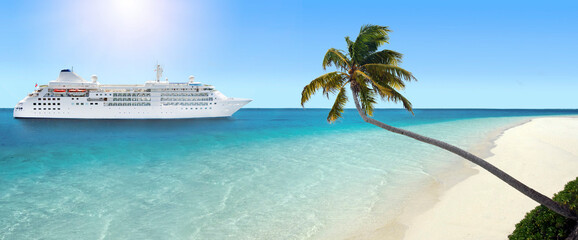 Cruise ship arriving at tropical beach