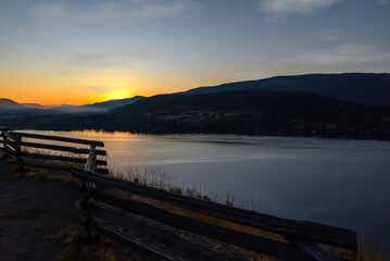 Sunrise over mountains and lake