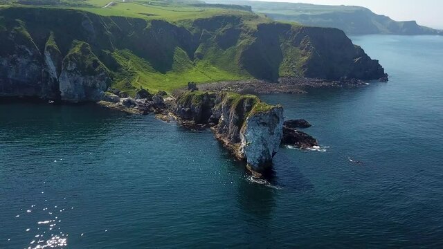 Kinbane Castle in County Antrim, Northern Ireland, on a long, narrow limestone headland projecting into the sea, drone shot