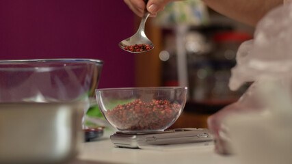 close up of a woman making a tea blend