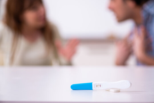 Young couple in unexpected pregnancy concept at home