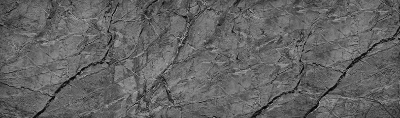 Black white grunge background. Rock texture with veins and cracks. Marble effect. Stone wall background. Web banner with rough texture.