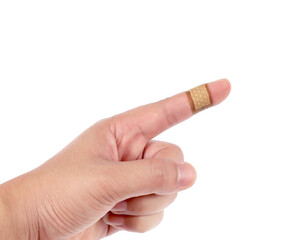 Brown medicine bandage on injured finger on white background.