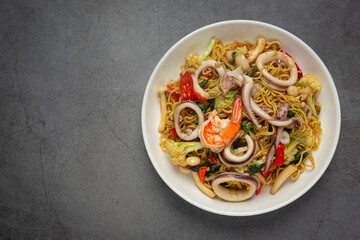Thai food; stir-fried instant noodles with seafood and variety vegetable