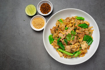 Thai food; Fried noodle with pork in soy sauce and vegetable
