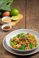 Thai food; Fried noodle with pork in soy sauce and vegetable