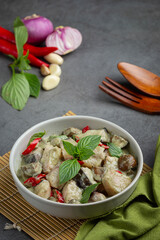 thai food; green coconut curry pork with eggplants