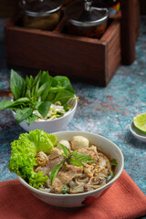 Thai food; Noodles with pork , meatball and vegetable