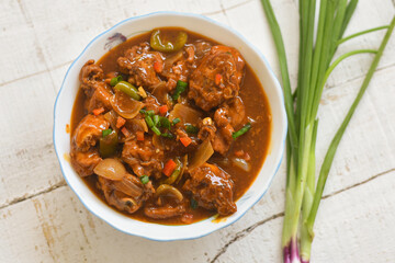 Chilli Chicken curry or Chicken manchurian Dry Gravy Kabab Tikka Chinese . Indian Starter sweet chilli chicken, red hot and spicy Mumbai, Delhi India. 