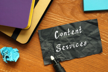 Financial concept about Content Services with sign on the piece of paper.