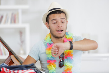 man wairing to boarding in airport lounge room