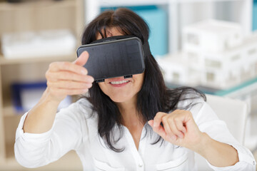 senior woman with virtual headset or 3d glasses