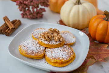 Healthy autumnal breakfast - sweet home made pumpkin pancakes