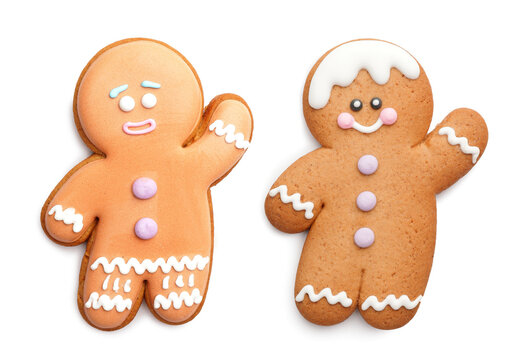 Tasty gingerbread cookies on white background