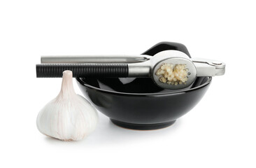 Garlic press with bowl on white background