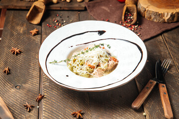 Salmon tagliatelle pasta with parmesan