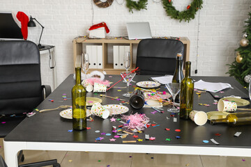 Interior of messy office after New Year party