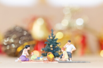 Miniature people, Happy family celebrating A Christmas  , Christmas and Happy New Year concept.