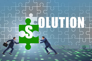 Solution concept with businessman solving jigsaw puzzle