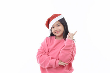 Asian little cute girl wearing Santa Claus cap