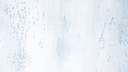 Light blue textured concrete background with light base darker in the recesses. Abstract texture for graphic design or wallpaper