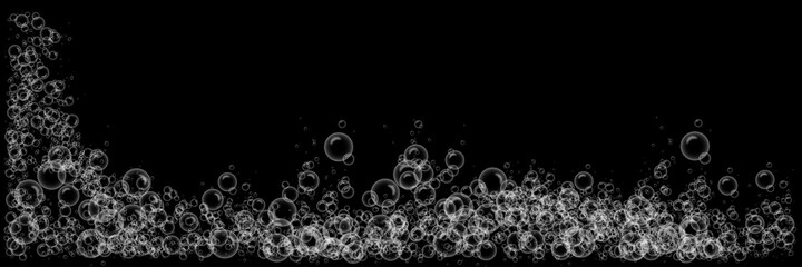 Soap water bubble texture isolated on black background. fizzy bubbles, gas or oxygen in the water. Realistic champagne drink, soap bubble effect.