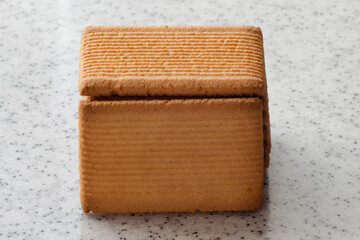 Rectangular shortbread cookies on a light marble top. Homemade baking.